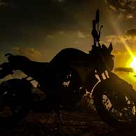 A motorcycle at sunset.