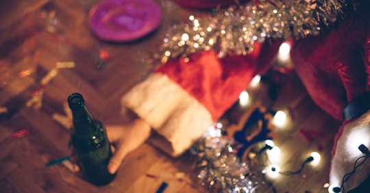 drunk Santa under Christmas tree