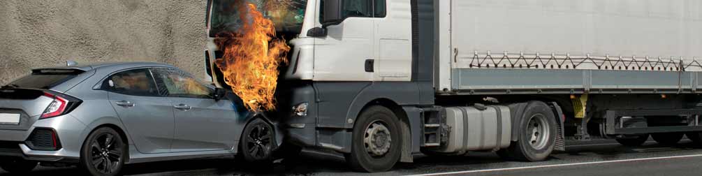 A car and a truck involved in a frontal crash.